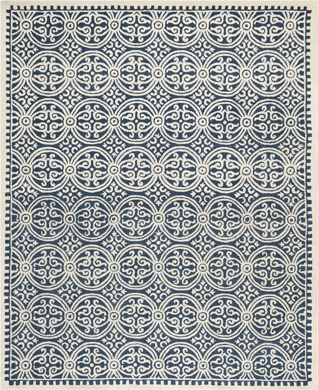 SAFAVIEH Cambridge Collection Area Rug - 8' x 10', Navy Blue & Ivory, Handmade Moroccan Wool, Ideal for High Traffic Areas in Living Room, Bedroom (CAM123G)