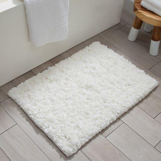White fluffy bathroom rug